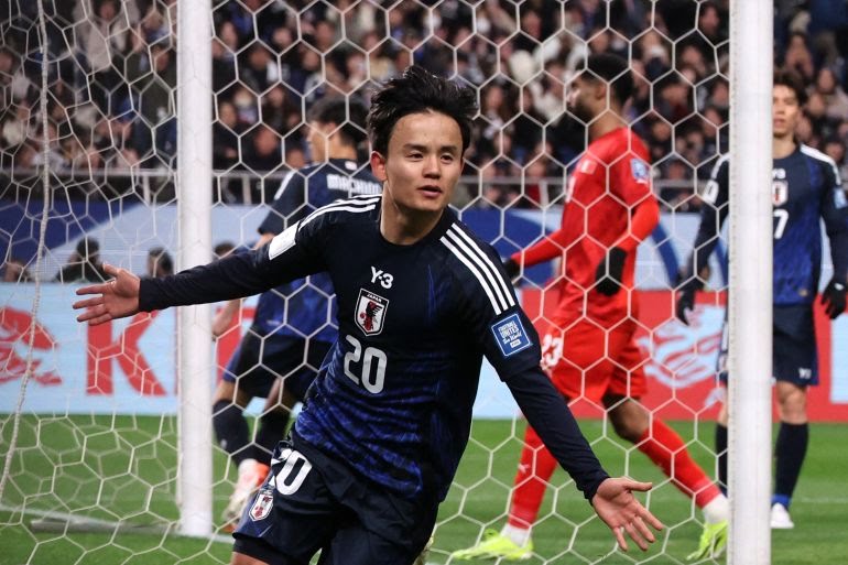 Japan's Takefusa Kubo celebrates scoring their second goal against Bahrain. Photo Credit- Kim Kyung-Hoon/Reuters/ Al Jazeera