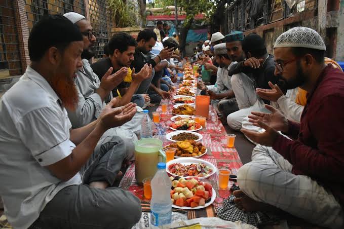 Adherents of the Islamic faith observing the Iftar during the Holy month of Ramadan