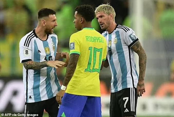 Argentina players Lionel Messi and Rodrigo de Paul showing aggression against Brazil's Rodrygo in their last encounter. Photo Credit- All Soccer net