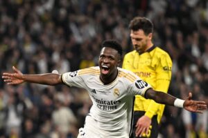 Real Madrid forward, Vinicius Junior celebrates his hat-trick against Borussia Dortmund. Photo Credit- The New York Times