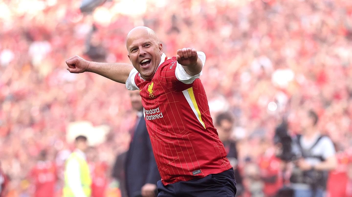 Liverpool's manager, Arne Slot in celebration after winning the 2024/25 Premier League trophy