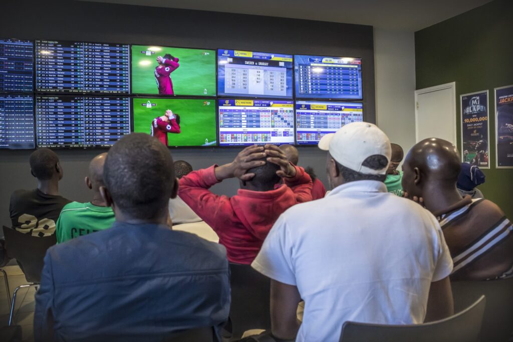 Nigerian punters at a gambling shop. Photo Credit- Rest of the World