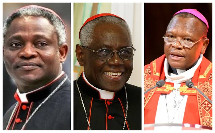 Cardinal Peter Turkson (left), Cardinal Robert Sarah (center), and Cardinal Fridoyin (right). Photo Credit- Matooke Republic