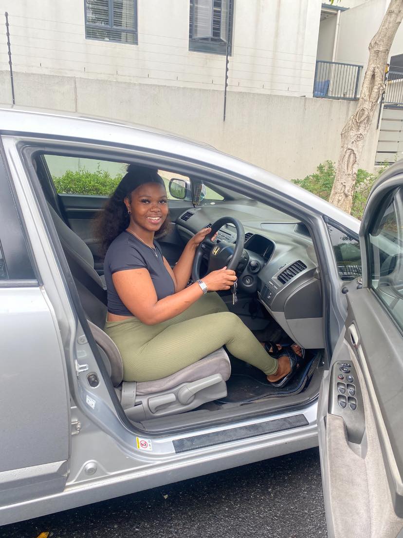 Cape Town cashier, Aseza Limelintaka, fired after car purchase causes workplace tension.