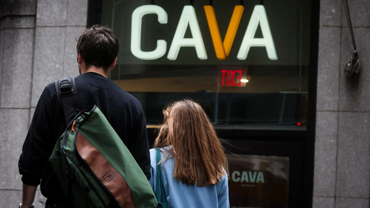 Customers arrive at a Cava restaurant in New York City on June 22, 2023. Brendan Mcdermid | Reuters