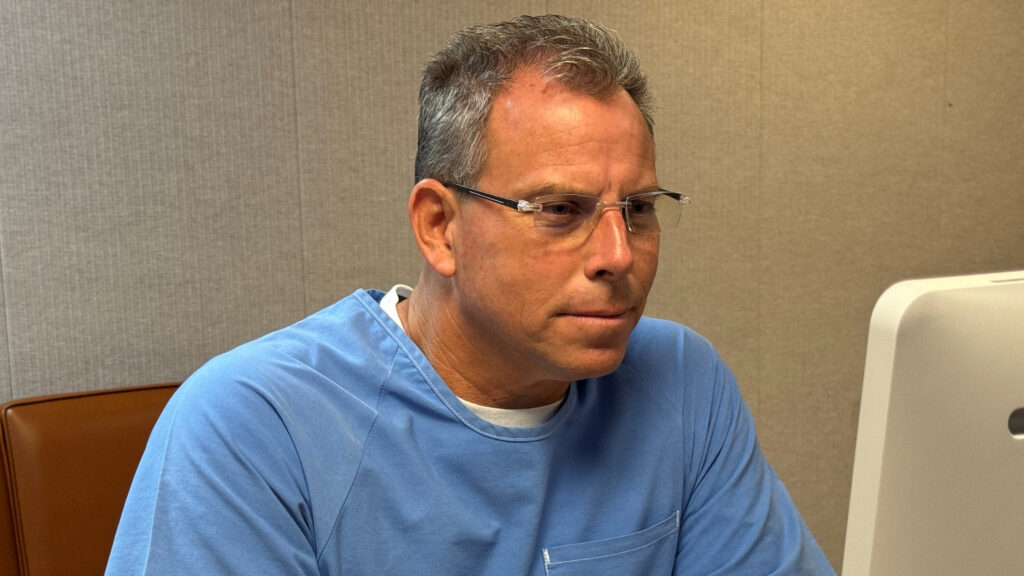 Erik Menendez appears via video during parole hearing at Donovan Correctional Facility