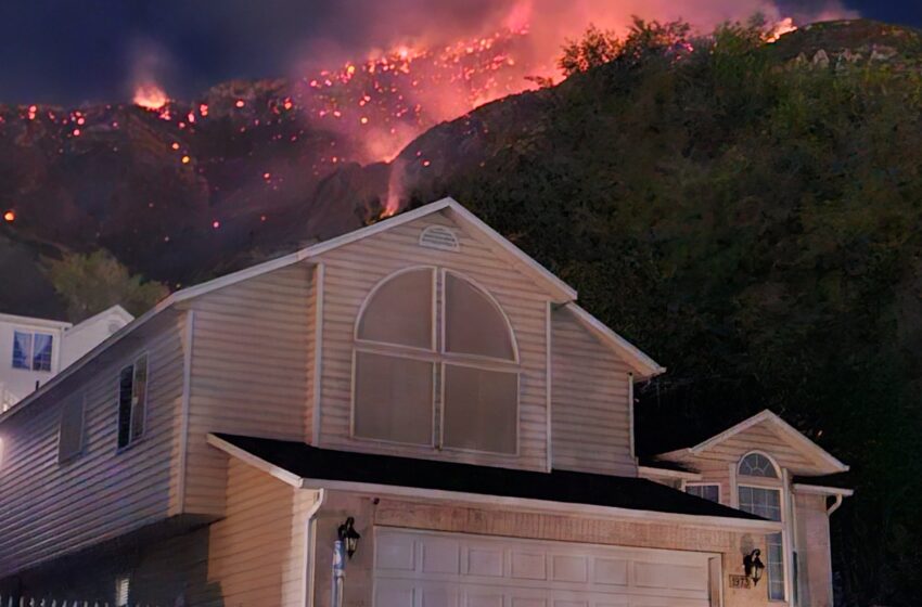 Aerial crews battle the Buckley Draw Fire as smoke billows over Utah Valley Sunday evening.