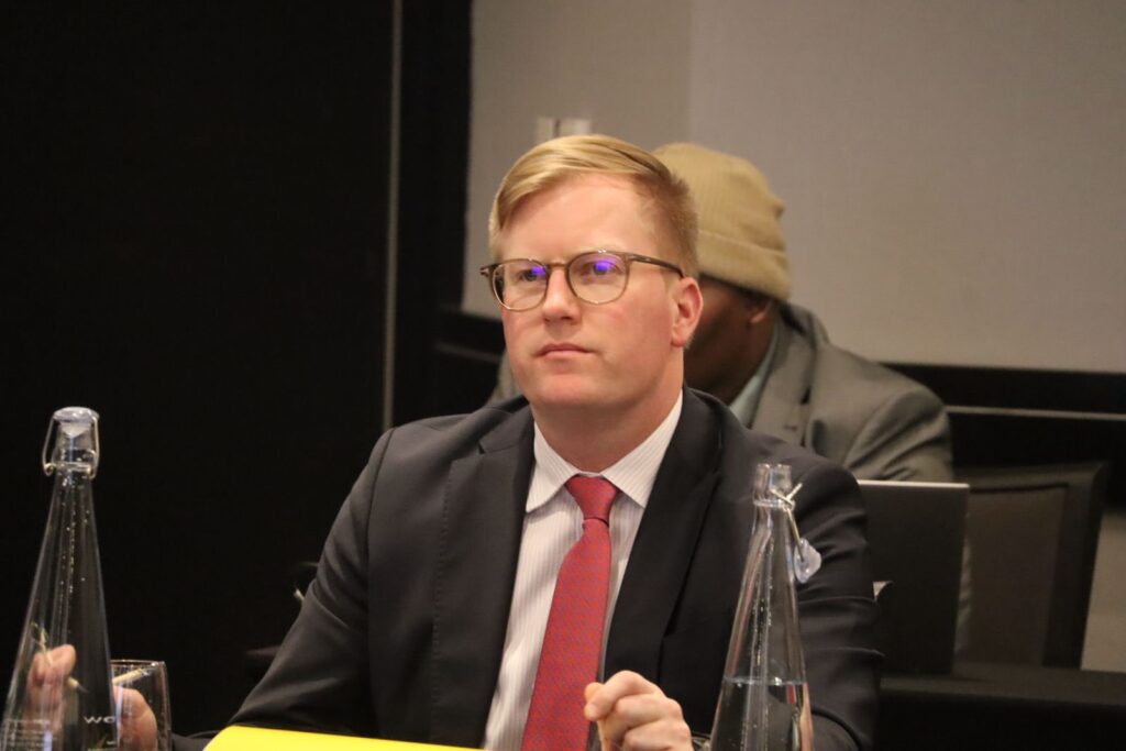 Minister Dean Macpherson