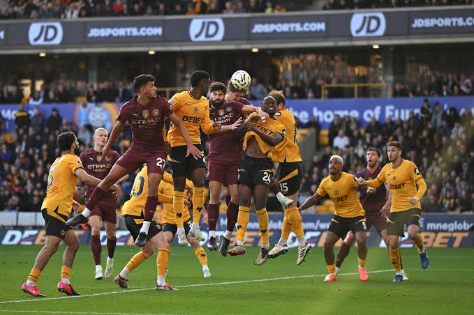 Wolves players defending a corner kick vs Man City players last season. Photo Credit- SkySports