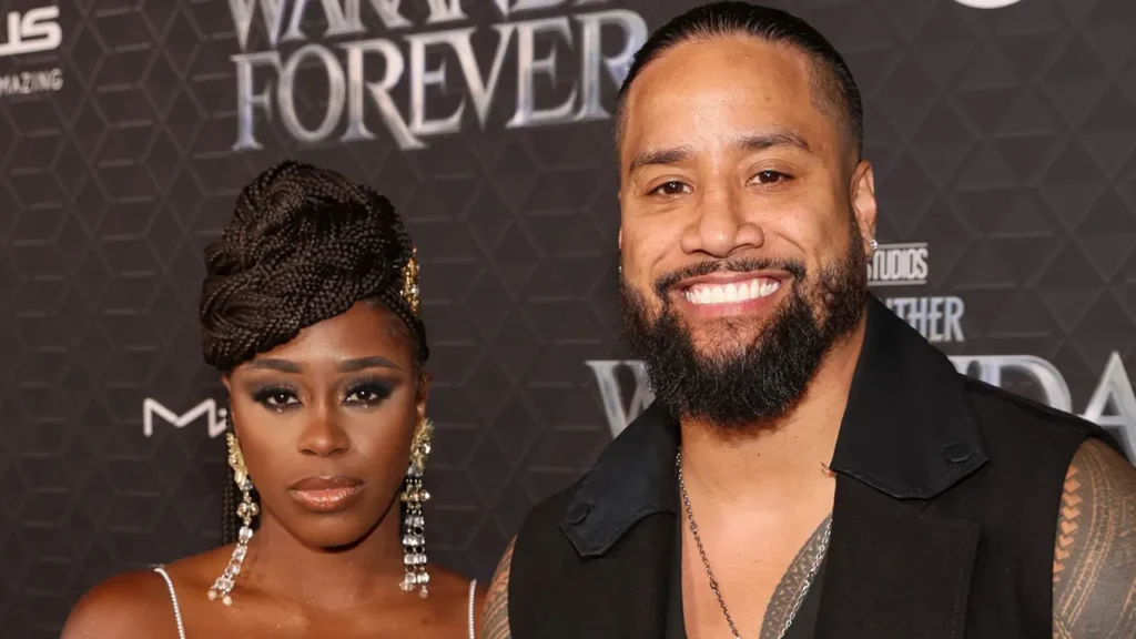 WWE stars, Naomi and Jimmy USO on the Wakanda Forever Red Carpet.