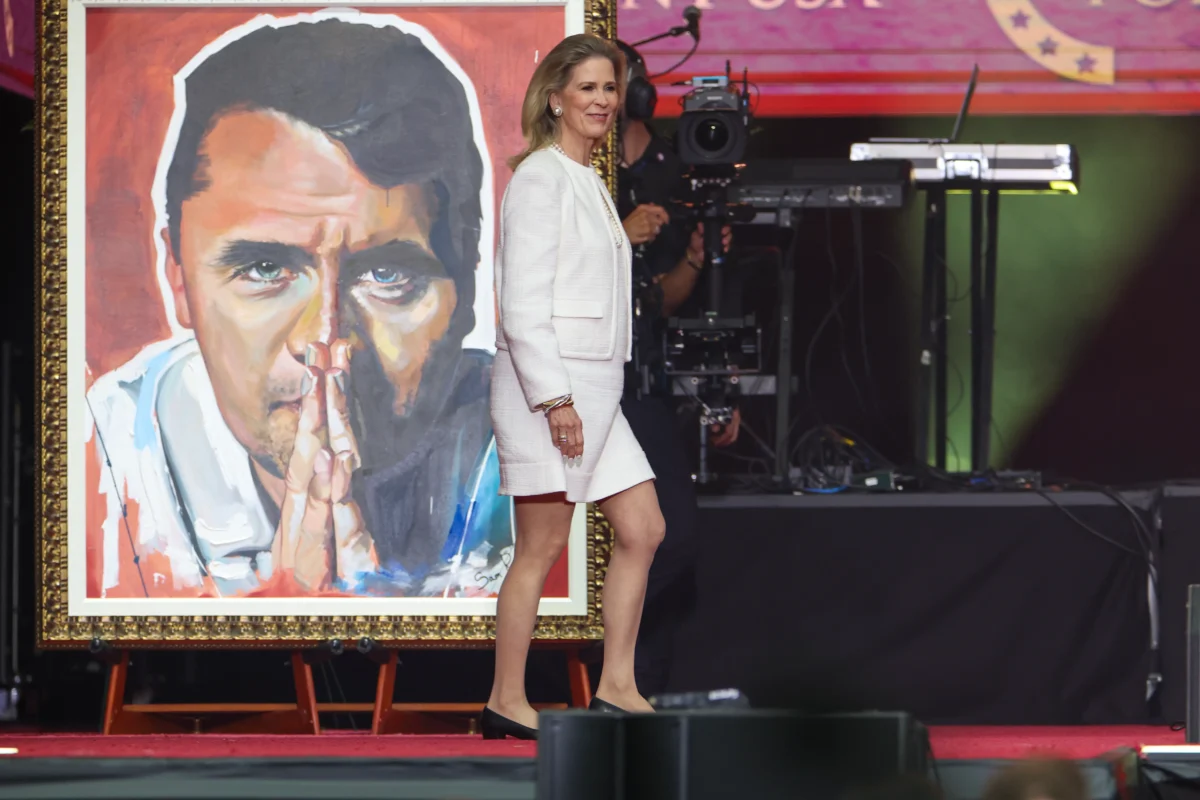 Philanthropist Rebecca Dunn walks onstage during the memorial service for political activist Charlie Kirk at State Farm Stadium on September 21, 2025 in Glendale, Arizona. Image Credit: Joe Raedle/Getty Images