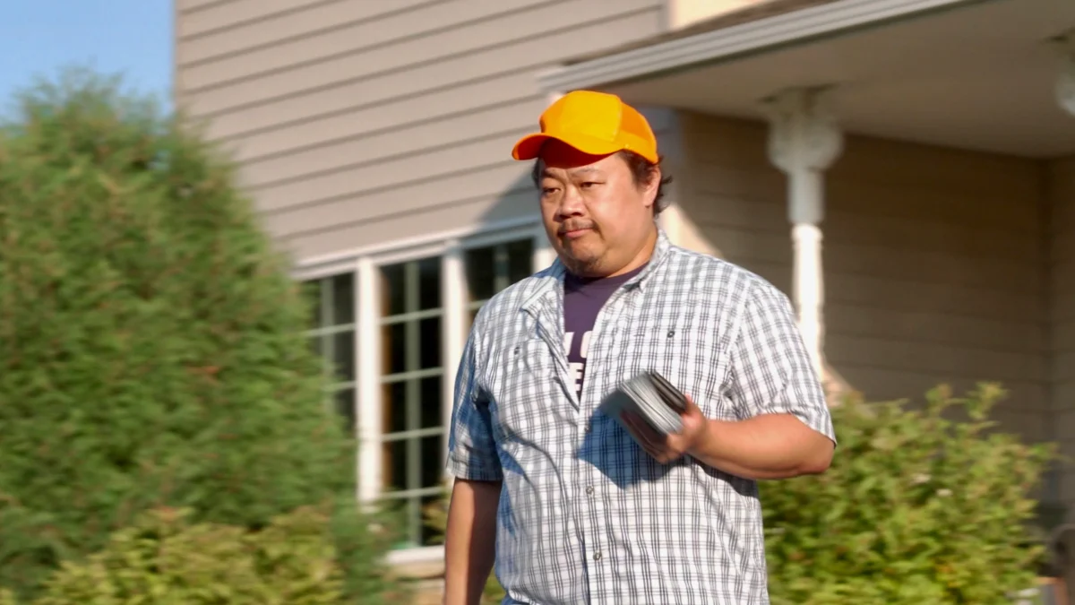 Xp Lee, Democratic candidate for Minnesota house district 34B, knocks on doors during campaigning in Brooklyn Park, Minn., Thursday, Sept. 11, 2025. Image Credit: AP Photo/Mark Vancleave