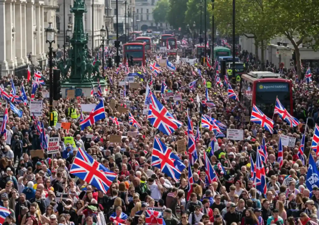 Crowds waving Union Jacks and St George’s Cross flags in central London
