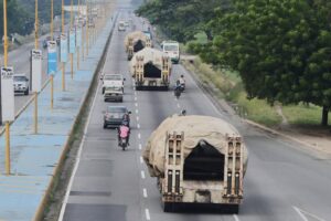 Trucks transport tanks in Venezuela after the government announced a military mobilisation following the US deployment of warships in the regionAP