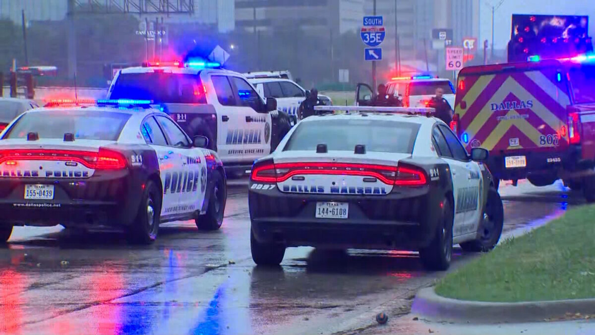 Police investigate after a sniper opened fire at a Dallas ICE facility.
