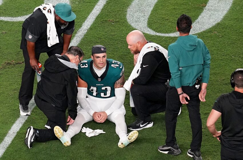 Ben VanSumeren carted off after suffering a knee injury on the opening kickoff against the Cowboys.