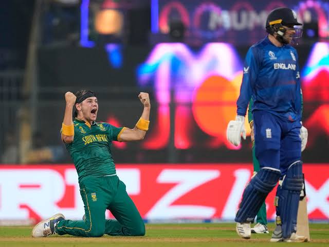 South African cricketer celebrating the win behind English cricketer. Photo Credit- Aljazeera