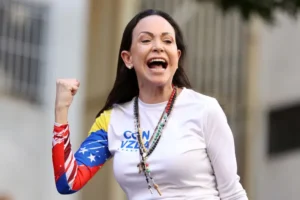 (FILES) Venezuelan opposition leader Maria Corina Machado gestures supporters during a protest called by the opposition on the eve of the presidential inauguration, in Caracas on January 9, 2025. Venezuela’s opposition leader Maria Corina Machado wins the 2025 Nobel Peace Prize, the Norwegian Nobel Committee announced on October 10, 2025. (Photo by Pedro MATTEY / AFP)