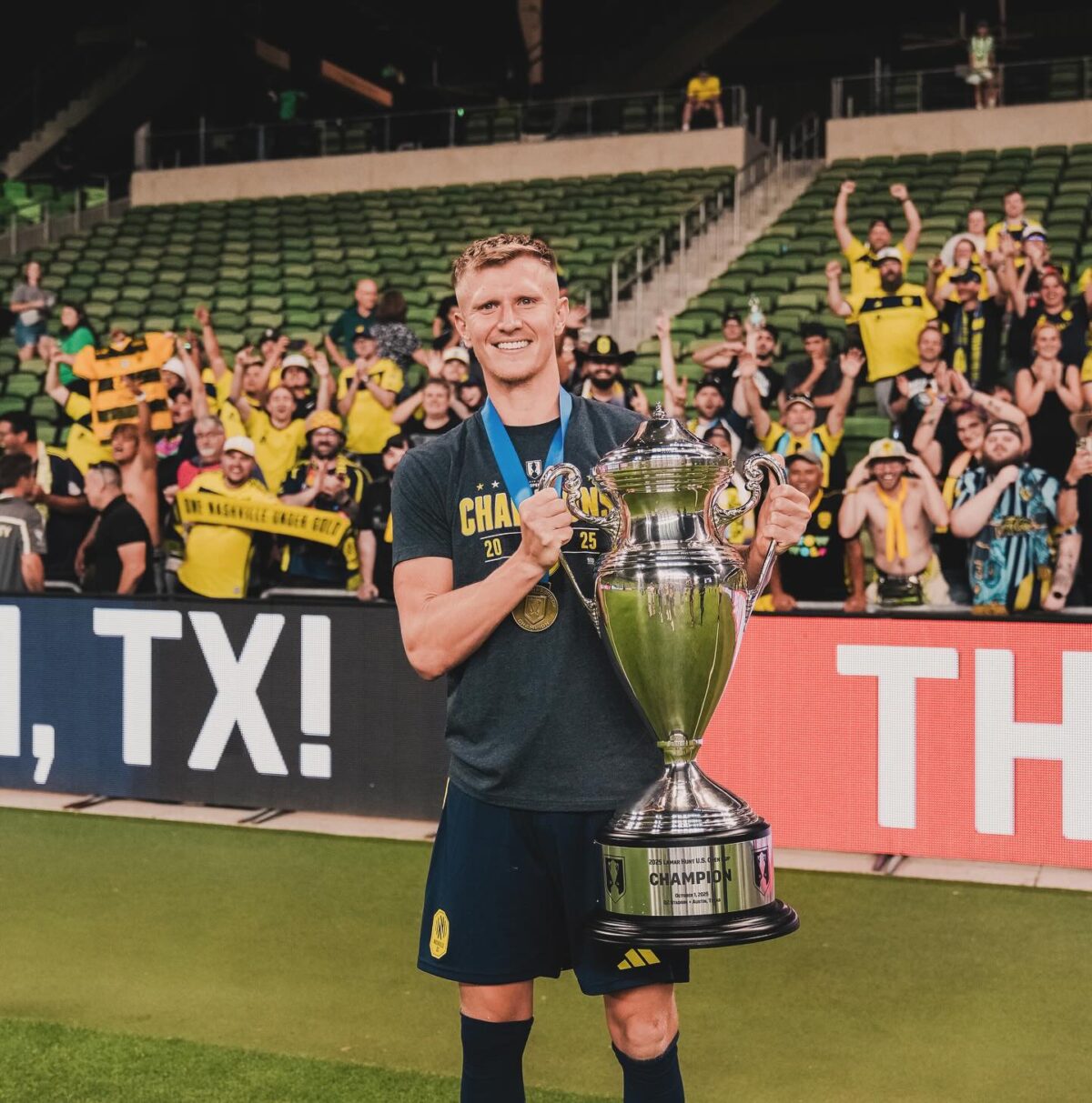 Sam Surridge with the US Open Cup.