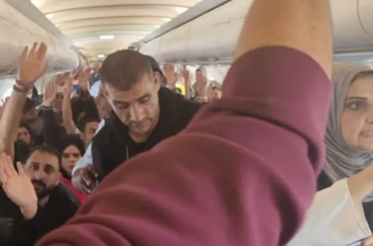  Why were over 150 Palestinians held on a plane in South Africa, and what forced authorities to let them in?