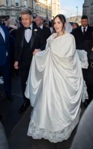 Proud dad Gordon led his daughter Holly at her wedding to the Olympic swimmerCredit: Goff