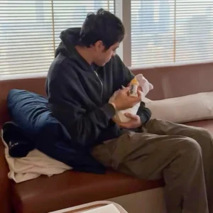 Pete Davidson and his newborn daughter.