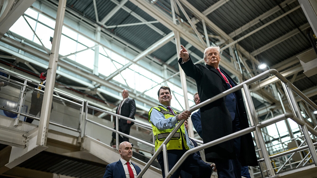 President Donald Trump acknowledges employees during a tour of the Ford River Rouge Plant in Dearborn, Michigan. Image Source: The White House via X