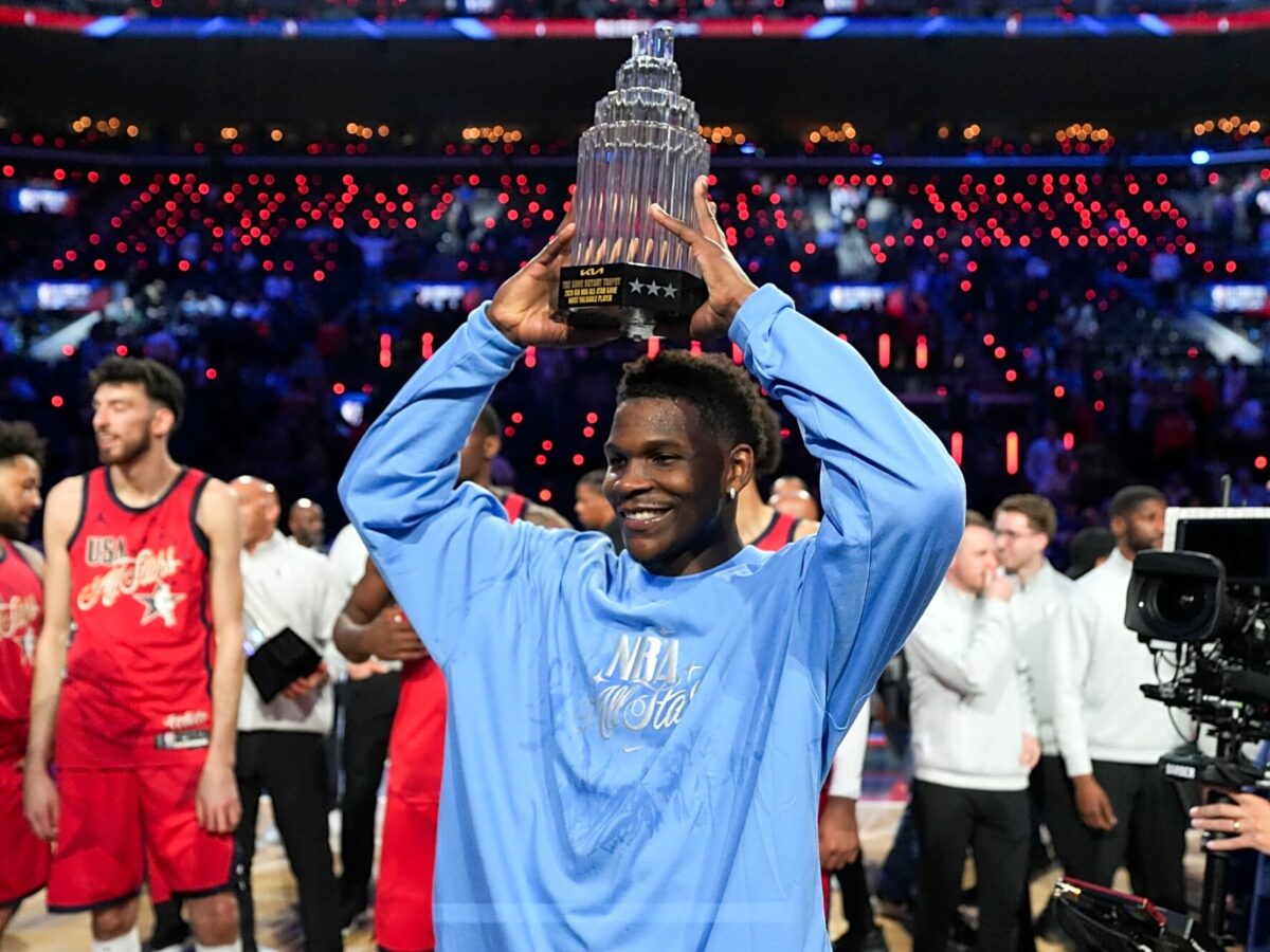Team USA Stars guard Anthony Edwards (5) of the Minnesota Timberwolves poses with the MVP trophy after the 75th NBA All Star Game at Intuit Dome. Kirby Lee-Imagn Images