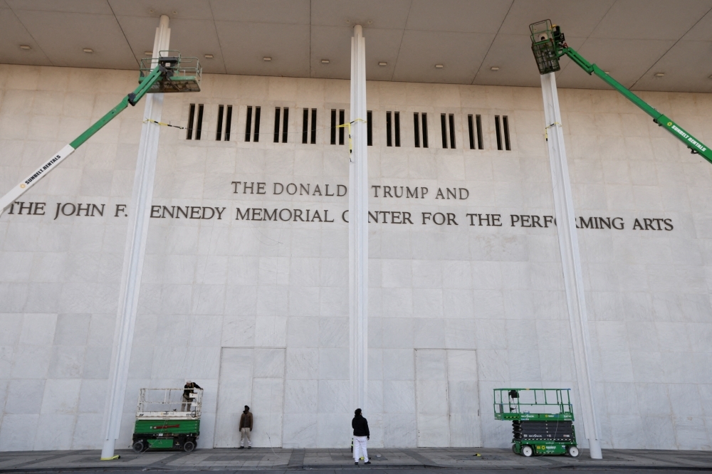 The newly added lettering for US President Donald Trump’s name is displayed at the facade of the John F. Kennedy Centre for the Performing Arts, a day after its board announced it would rename the institution The Donald J. Trump and The John F. Kennedy Memorial Centre for the Performing Arts, in Washington, D.C. December 19, 2025. — Reuters pic