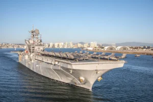 USS Tripoli deploys to Middle East with Marines and F-35s
