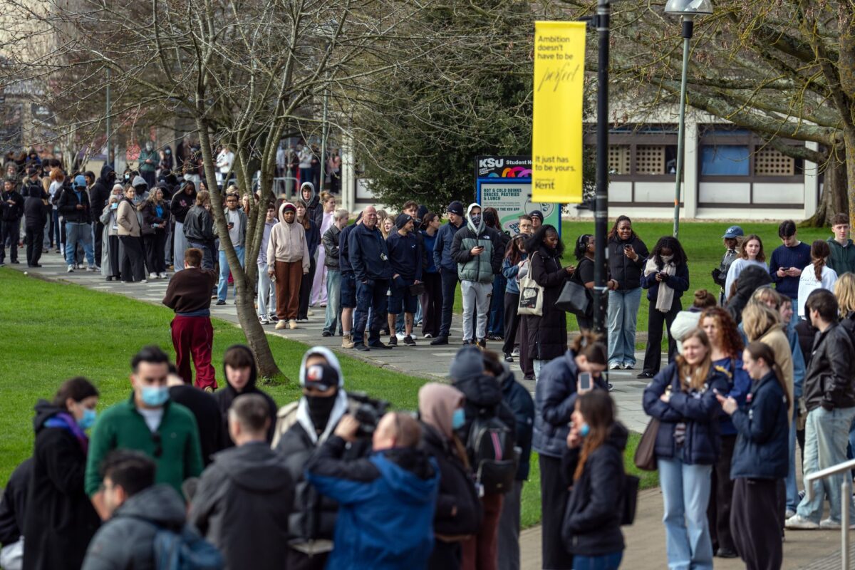 Students queue for antibiotics at the University of Kent as two people die from meningitis in the area