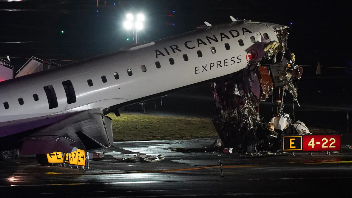 An Air Canada Jet sits on the runway at LaGuardia Airport, Monday, March 23, 2026, after colliding with a Port Authority aircraft rescue and firefighting vehicle after landing in New York. (Ryan Murphy/The Associated Press)