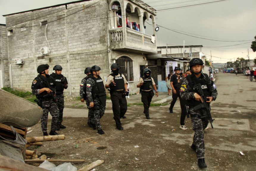 Elite members of the Ecuadorian police carry out an anti-drug operation in the Batallon del Suburbio neighbourhood, in southern Guayaquil, Ecuador, on January 23, 2026. Gerardo Menoscal/AFP/Getty Images
