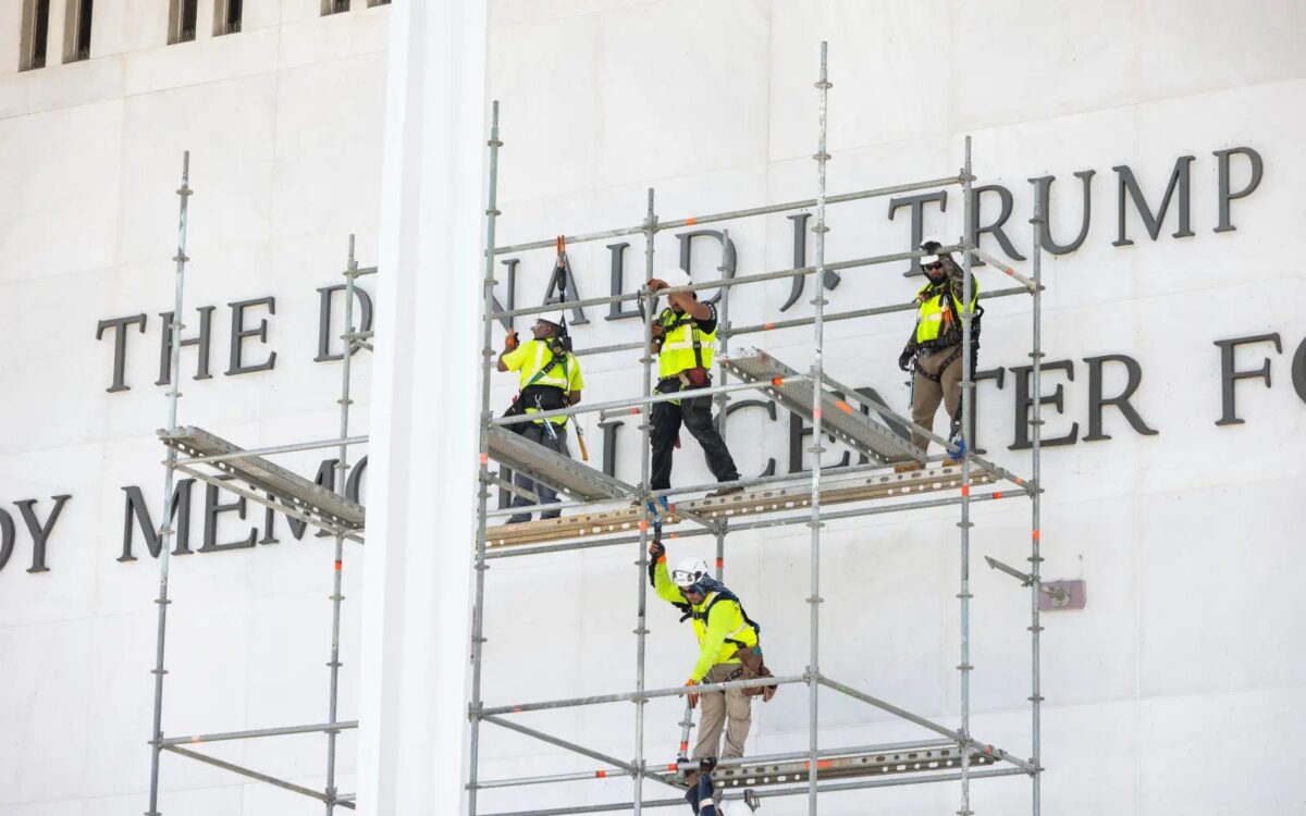 Workers remove Trump’s name from Kennedy Center facade. Image Credit: EPA Images Pic