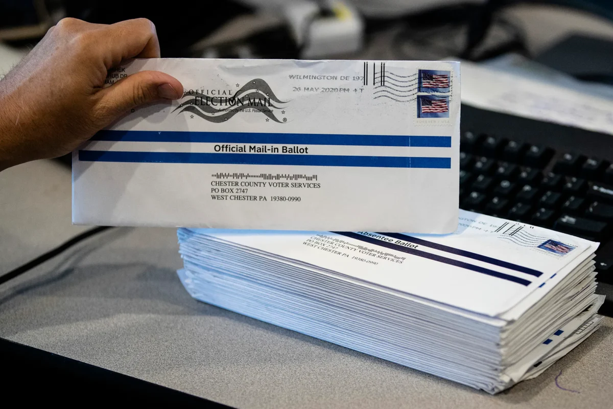 In this May 28, 2020, file photo, mail-in primary election ballots are processed at the Chester County Voter Services office in West Chester, Pa. (Matt Rourke/AP)