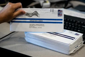 In this May 28, 2020, file photo, mail-in primary election ballots are processed at the Chester County Voter Services office in West Chester, Pa. (Matt Rourke/AP)