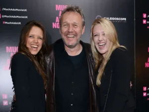 Actresses Daisy Head and Emily Head with their father Anthony at a film screening in 2013