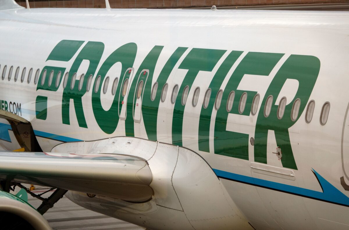  Frontier flight to Chicago diverted after passenger allegedly tries to open exit door and attack crew member