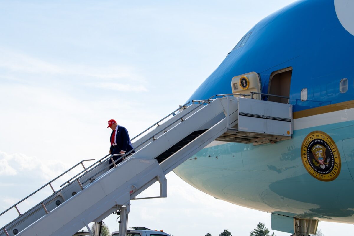 Trump coming out of the Air Force One. Credit: U.S. Air National Guard photo by Senior Airman Nathan Wingate