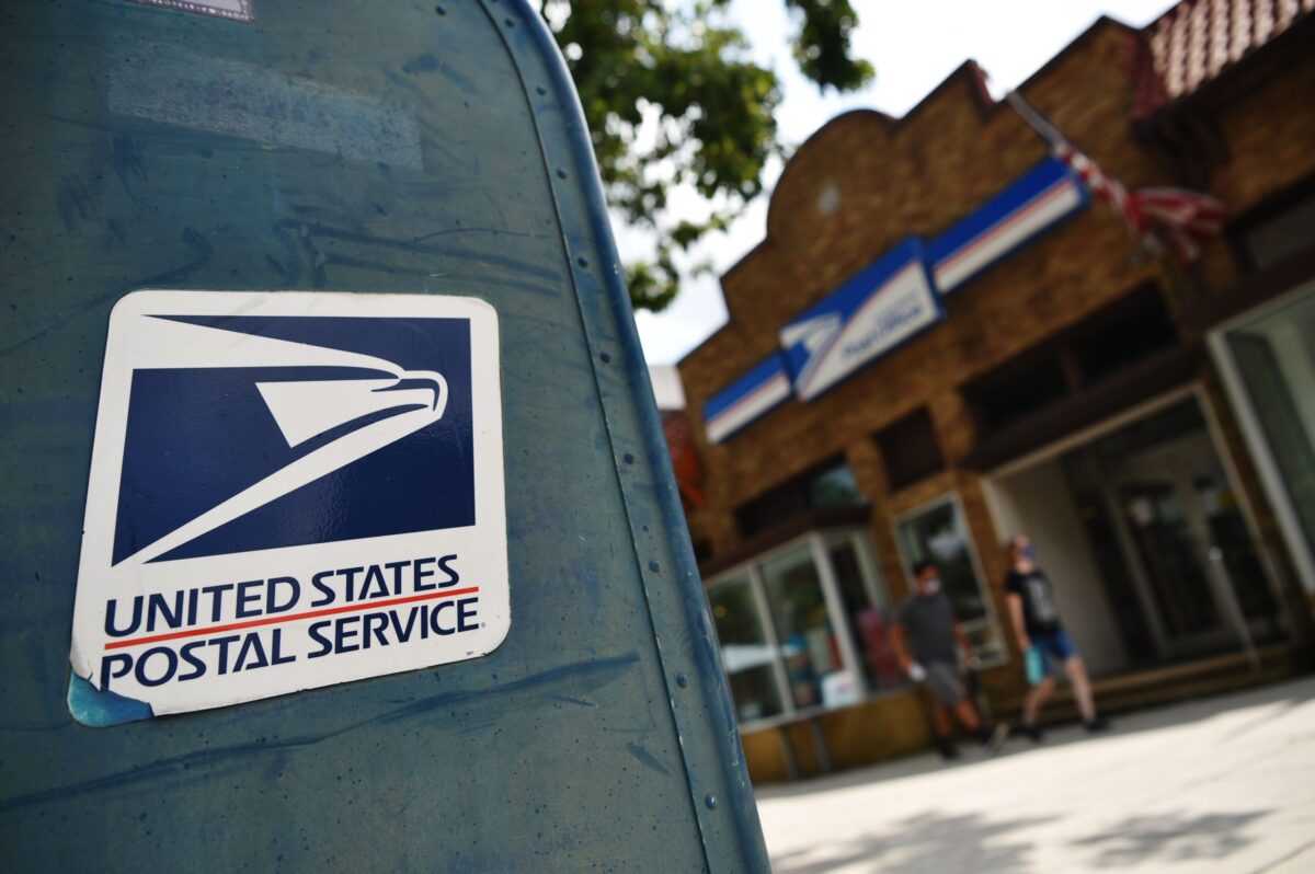Judge halts Trump's USPS ballot order. Image Credit: MANDEL NGAN / AFP via Getty Images
