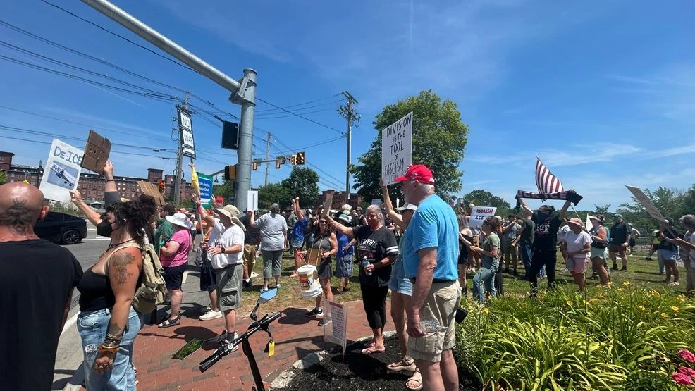 Protesters gather outside Sen. Susan Collins' office in Biddeford following an ICE-involved fatal shooting. Image Credit: WGME