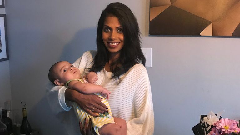Nishika Samaratunga holding their son Blaine. Pic: Ben Baier/PA