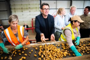 Prime Minister Andy Burnham sees potatoes being sorted (James Manning/PA) (PA Wire)