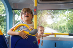 Children under 16 ride local buses free across England this August. Image Credit: Getty Images