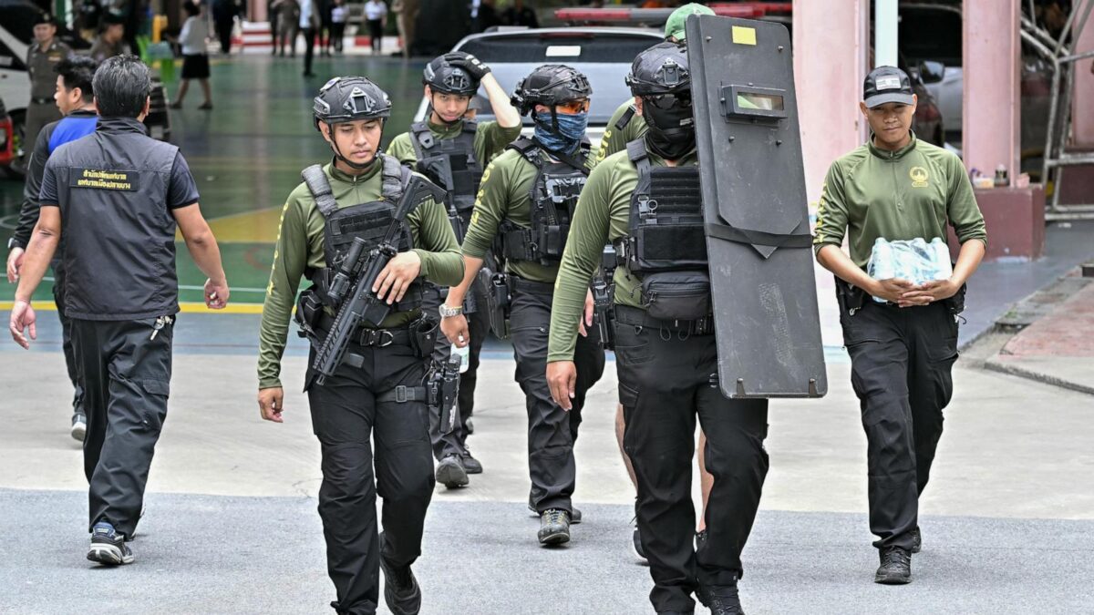 Armed police walk through the school premises after a shooting in Bang Kruai district, Nonthaburi province, north of Thailand's capital Bangkok, on August 7, 2026. Image Credit: Suwanrumpha/AFP via Getty Images