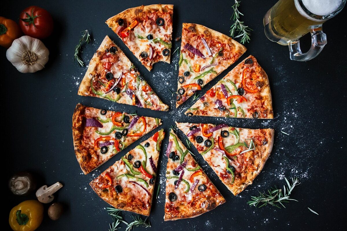 Discover the surprising history behind seven popular foods, including pizza