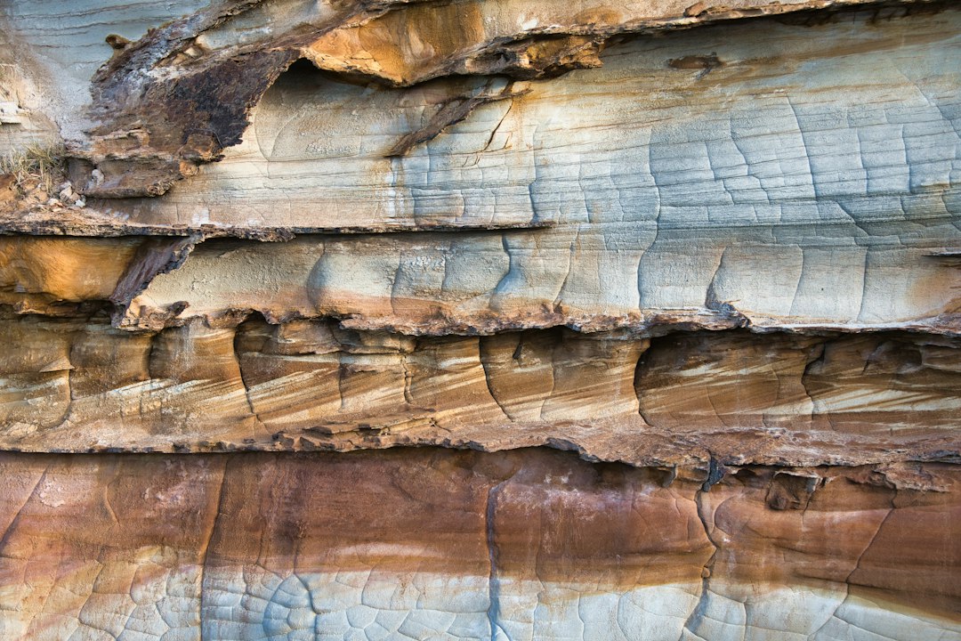 Generic rock strata illustration; not imagery from Ijebu-Ode or proof of a fault line.