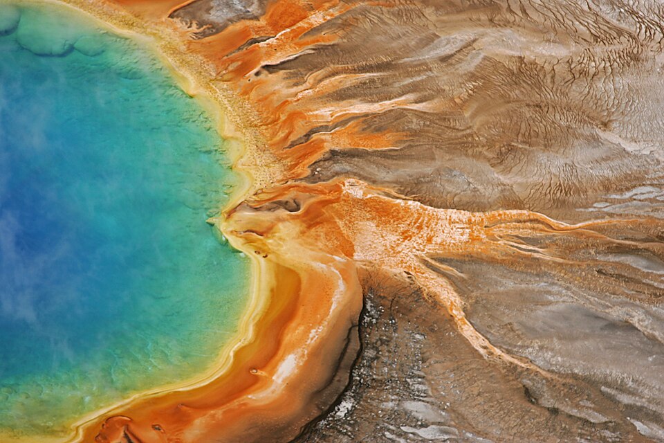 Blue-green water and orange margins of Grand Prismatic Spring in Yellowstone